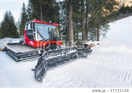 Winter scenery and snow removal vehicle in Austria 57731130