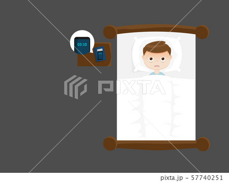 sleepless man on bed in night 57740251