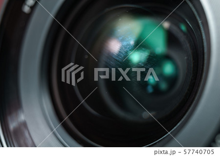 Close up dust and peel on a camera lens  57740705