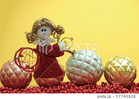 Beautiful Christmas bauble angel toy on a and Beautiful Christmas bauble angel toy on a and 57740928