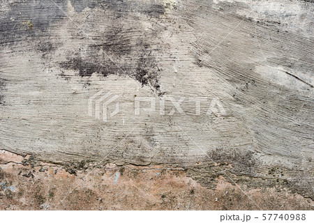 Texture of a concrete wall with cracks and scratches Texture of a concrete wall with cracks and scratches 57740988