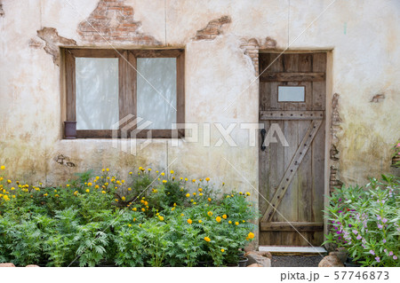 wooden window and door on old wall 57746873