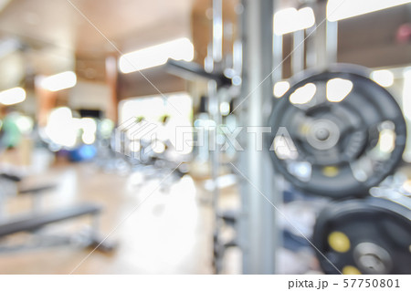 Blur gym background fitness center or health club with blurry sports exercise equipment for aerobic workout and bodybuilding Blur gym background fitness center or health club with blurry sports exercise equipment for aerobic workout and bodybuilding 57750801