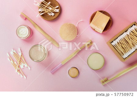 Plastic-free, zero waste cosmetics, flat lay pattern on a pink background, top shot. Bamboo Plastic-free, zero waste cosmetics, flat lay pattern on a pink background, top shot. Bamboo 57750972