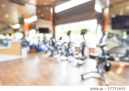 Blur gym background fitness center or health club with blurry sports exercise equipment for aerobic workout and bodybuilding 57751642