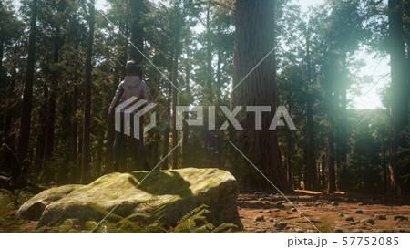 Woman in Yosimite national park near sequoia 57752085