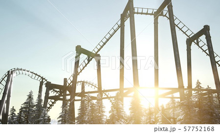 old roller coaster at sunset in forest 57752168