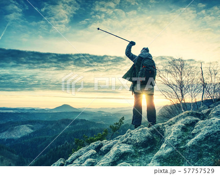 Young smiling woman hiker hiking rocky trail, Young smiling woman hiker hiking rocky trail, 57757529