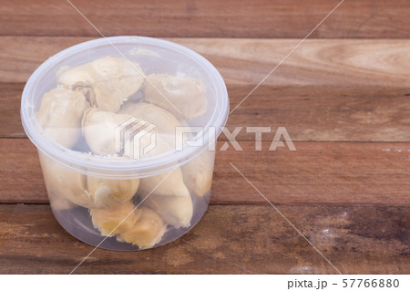 Durian flesh or pulp packed into container for 57766880