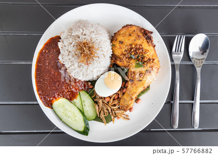 Nasi lemak with fried chicken and sambal, Malaysia 57766882