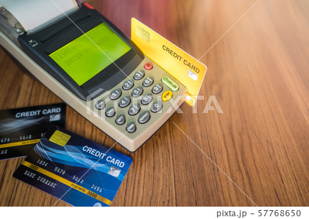 Many credit cards are used in the shop. Shopping Many credit cards are used in the shop. Shopping 57768650