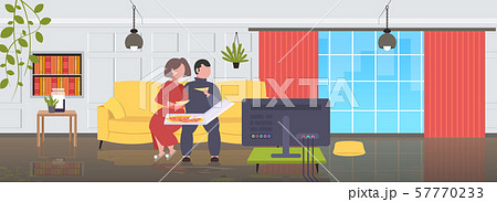 fat obese man woman sitting on couch eating pizza fast food unhealthy nutrition concept couple 57770233