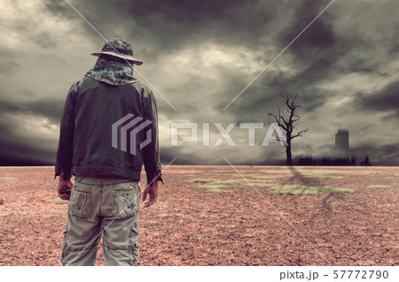 Abstract Man on land to the ground dry cracked. Abstract Man on land to the ground dry cracked. 57772790