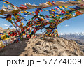 Colorful tibetan prayer flags on rock mountain in 57774009