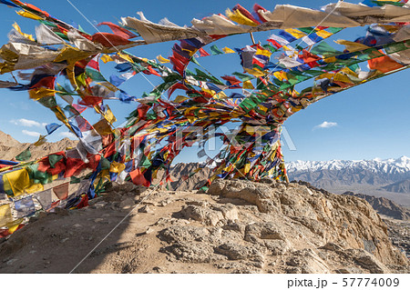 Colorful tibetan prayer flags on rock mountain in Colorful tibetan prayer flags on rock mountain in 57774009