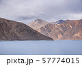 Pangong Lake with rocky mountains situated on the 57774015