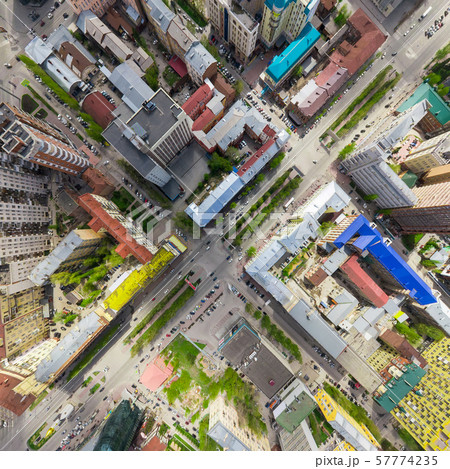 Aerial city view with crossroads and roads, houses buildings. Copter shot. Panoramic image. 57774235