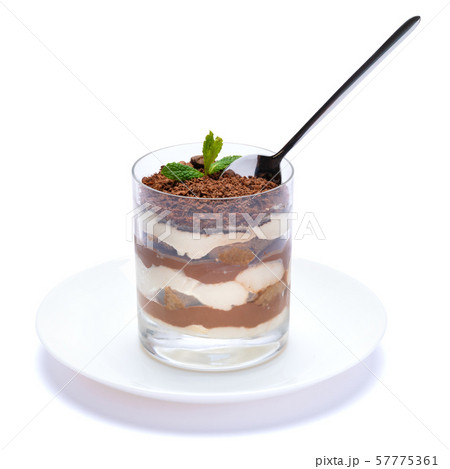 Classic tiramisu dessert in a glass cup on the plate on white background with clipping path 57775361