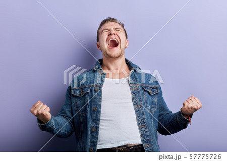 happy man with wide open mouth, closed eyes expressing his gladness, happiness happy man with wide open mouth, closed eyes expressing his gladness, happiness 57775726