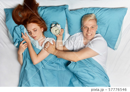 young couple are being late at work 57776546