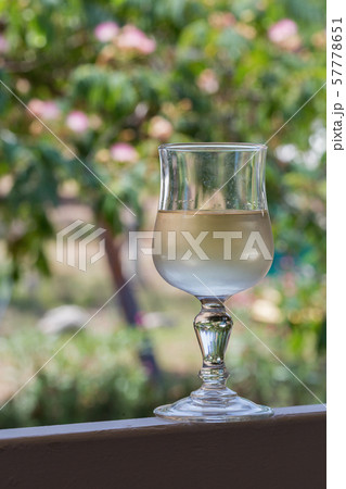 White wine glass outdoor closeup 57778651