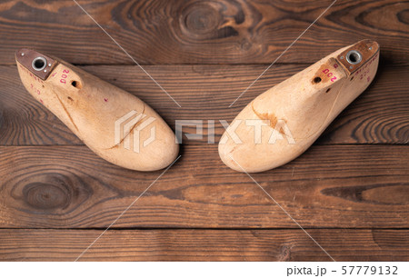 Leather samples for shoes and wooden shoe last on Leather samples for shoes and wooden shoe last on 57779132