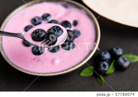 Tasty fresh blueberry yoghurt shake dessert in 57780074