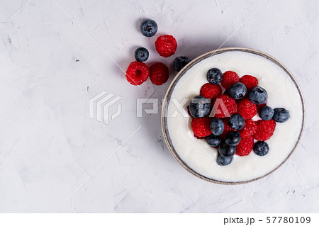 Tasty fresh blueberry raspberries yoghurt shake 57780109