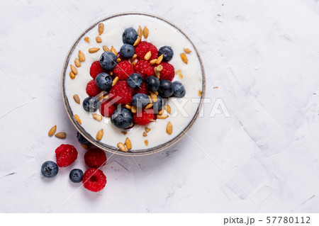 Tasty fresh blueberry raspberries yoghurt shake 57780112