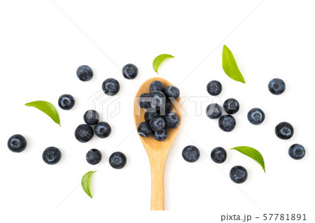 blueberries on spoon isolated on white background 57781891