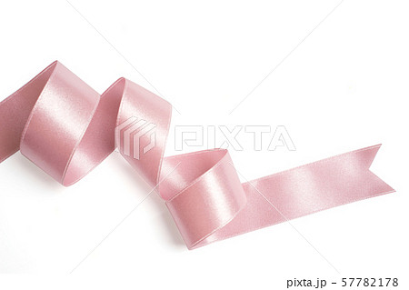 pink ribbon in roll on white 57782178