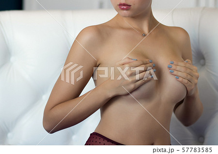 Young beautiful girl with magnificent breasts chic - Stock Photo