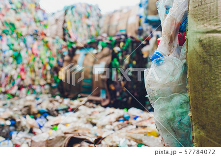 Plastic bales of tetra pak juice packages at waste processing plant. Concept of separate garbage 57784072