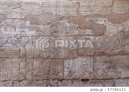 Hieroglyphs on wall of Karnak Temple Complex, famous architectural landmark in Luxor, Egypt. 57784121