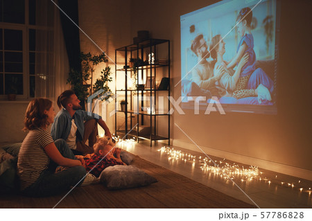 family mother father and children watching 57786828