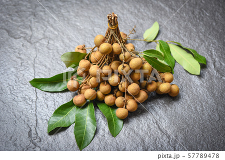 Longan fresh tropical fruit and green leaf in 57789478