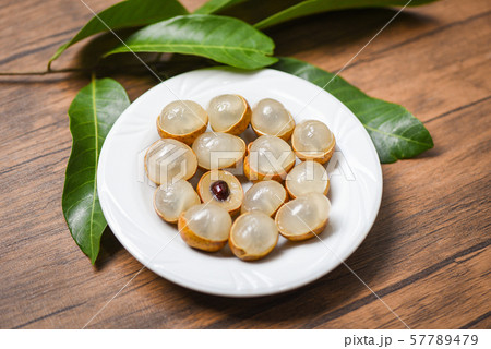 Longan fresh tropical fruit and green leaf in 57789479