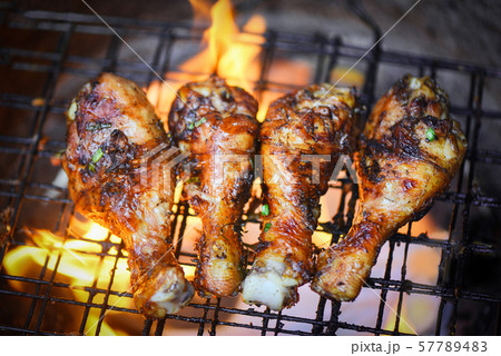 Grilled chicken legs barbecue with herbs and 57789483