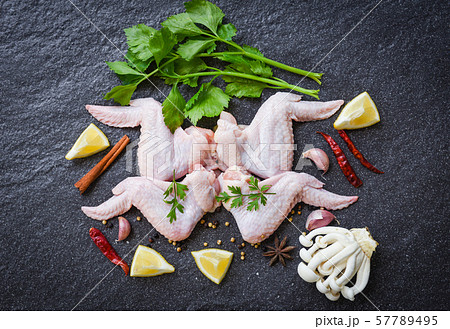 raw chicken wings with lemon chilli herbs and raw chicken wings with lemon chilli herbs and 57789495