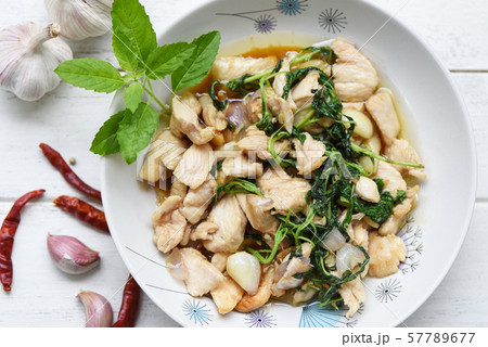 Basil chicken fillet with garlic chilli Spicy Thai Basil chicken fillet with garlic chilli Spicy Thai 57789677