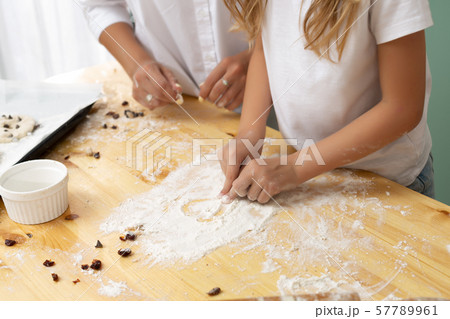 Heart of flour on wooden desk painted by a child 57789961