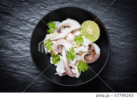 squid salad bowl with lime herbs and spices on squid salad bowl with lime herbs and spices on 57790263