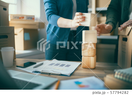people are working at warehouse people are working at warehouse 57794282
