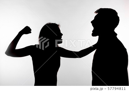 Domestic violence and abuse concept - Silhouette of a woman slapping a man 57794811