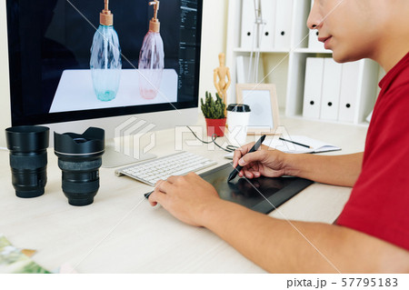 Retoucher using graphic tablet 57795183