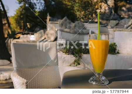 glass of fresh orange juice on the table glass of fresh orange juice on the table 57797944