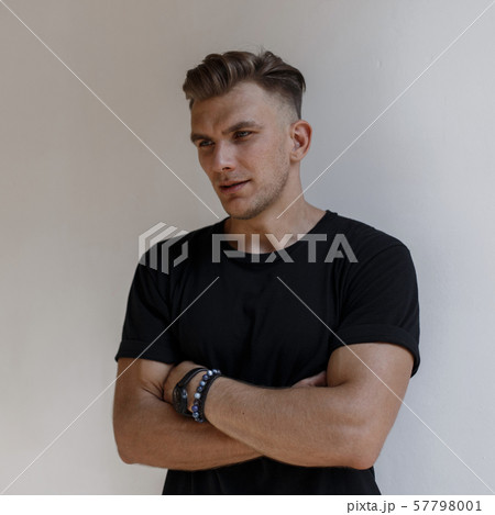 Stylish handsome American man with hairstyle 57798001