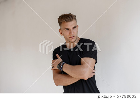 Fashionable handsome young man with hairstyle 57798005
