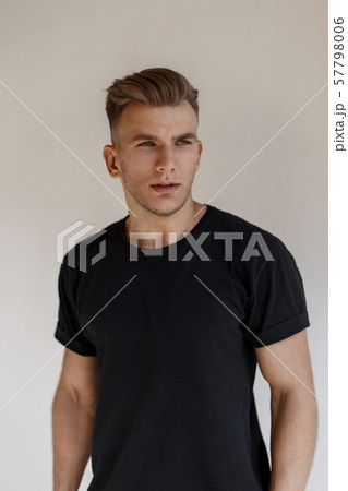 Fashionable handsome model man with hairstyle 57798006