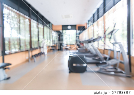 Blur gym background fitness center or health club with blurry sports exercise equipment for aerobic workout and bodybuilding 57798397